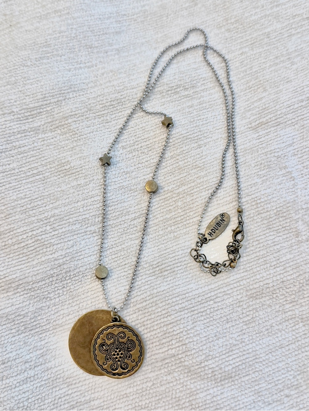Vintage mixed-metal pendant necklace by French jewelry designer Star Coin Charms